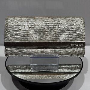Michael Kors Tilda clutch wallet metallic snakeskin embossed leather finish.